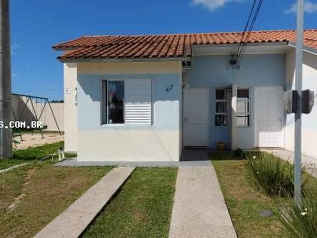 Imagem: A casa possui 2 Dormitórios, 1 Suíte, 1 Banheiro, 75m²