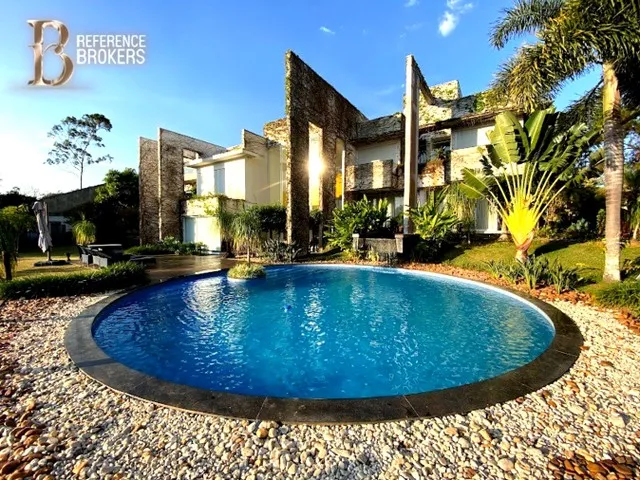 Imagem: A casa possui 5 Dormitórios, 3 Suítes, 5 Banheiros, 5
