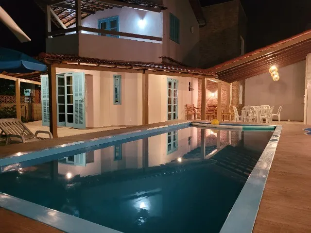 Imagem: A casa possui 3 Dormitórios, 1 Suíte, Acomodam 10