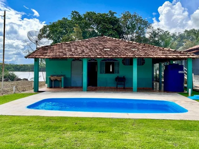Imagem: Rancho em Três Marias, Às Margens do Rio