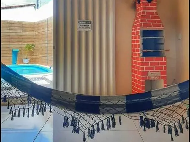 Imagem: A casa possui 2 Dormitórios, 1 Banheiro, Acomodam 10