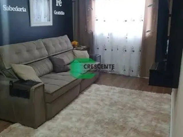 Imagem: O apartamento possui 2 Dormitórios, 1 Suíte, 2 Banheiros,