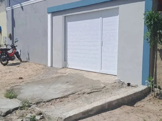 Imagem: A casa possui 2 Dormitórios, 2 Banheiros, 3 Vagas na