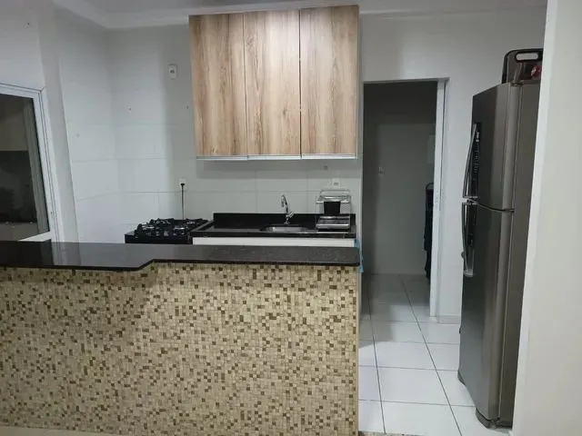 Imagem: O apartamento possui 2 Dormitórios, 1 Suíte, 2 Banheiros,