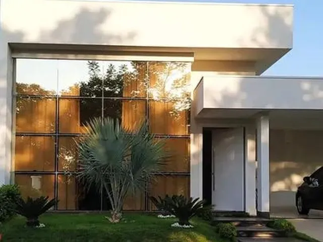 Imagem: A casa em condomínio possui 4 Dormitórios, 4 Suítes, 5