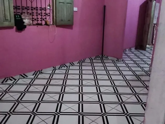 Imagem: A casa possui 3 Dormitórios, 2 Banheiros, 1 Vaga na