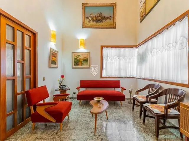 Imagem: Casa em Condomínio com 4 Suítes e Garagem
