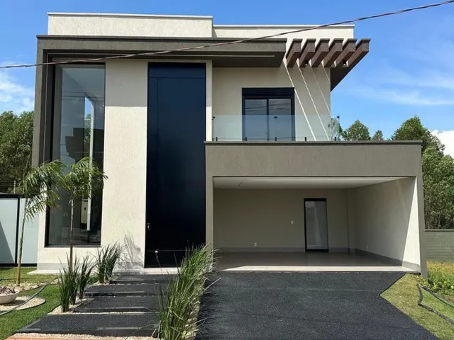 Imagem: A casa possui 4 Dormitórios, 4 Suítes, 5 Banheiros, 4 Vagas