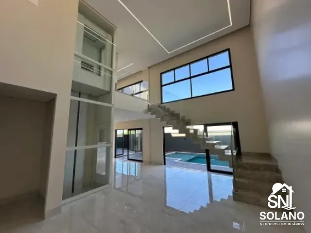 Imagem: A casa possui 4 Dormitórios, 4 Suítes, 6 Banheiros, 4 Vagas