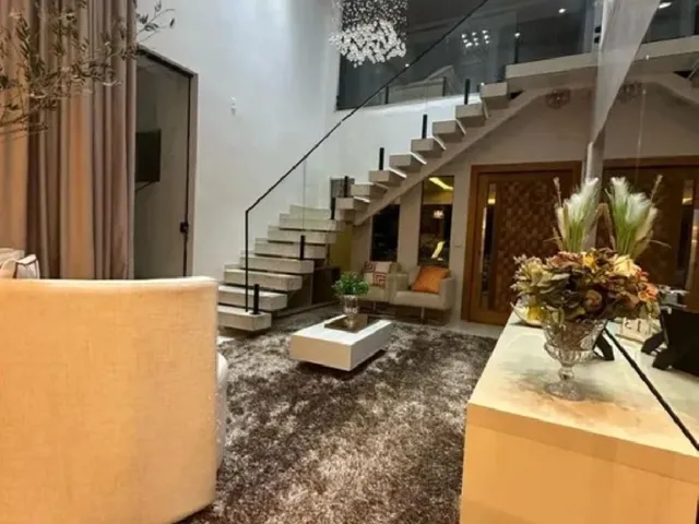 Imagem: A casa possui 5 Dormitórios, 4 Suítes, 5 Banheiros, 4 Vagas