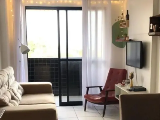 Imagem: O apartamento possui 2 Dormitórios, 1 Suíte, 2 Banheiros,
