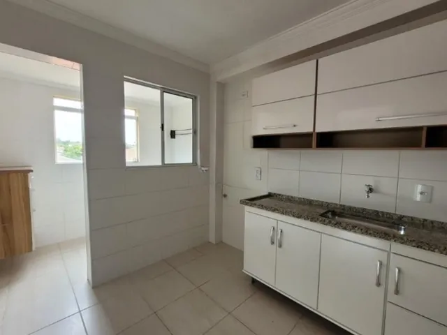 Imagem: O apartamento possui 2 Dormitórios, 1 Suíte, 2 Banheiros,