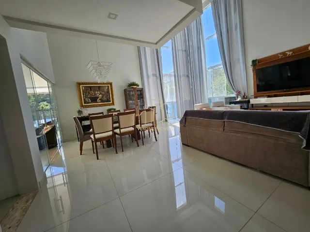 Imagem 7: Com conceito moderno e ambientes amplos essa belíssima casa com quatro suítes a venda
