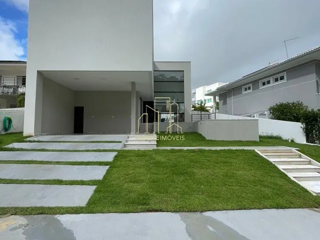 Imagem 2: Com conceito moderno e ambientes amplos essa belíssima casa com quatro suítes a venda