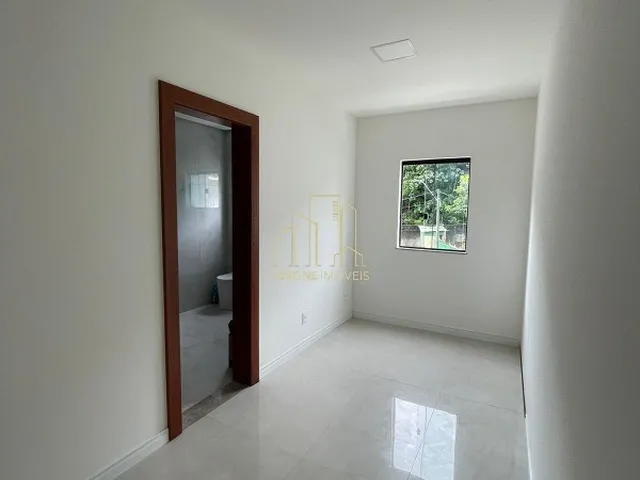 Imagem 14: Com conceito moderno e ambientes amplos essa belíssima casa com quatro suítes a venda