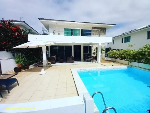 Imagem 2: Com conceito moderno e ambientes amplos essa belíssima casa com quatro suítes a venda