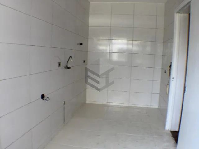 Imagem 5: Apartamento de 2 dormitórios com sacada e garagem coberta