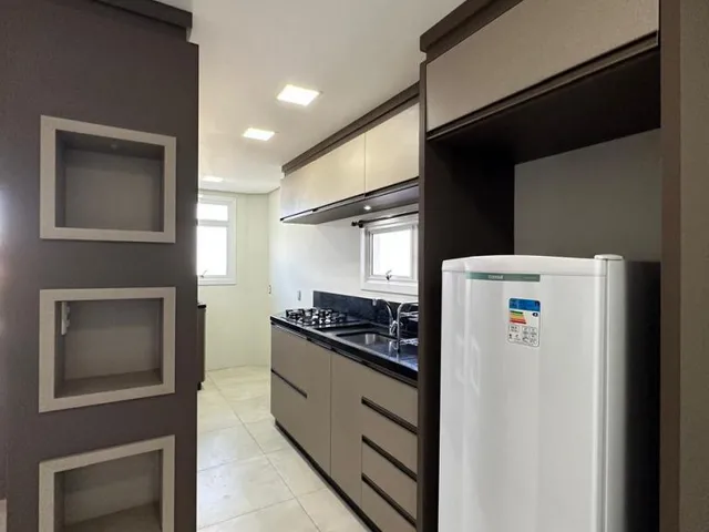 Imagem 9: Apartamento térreo à venda com dois dormitórios, sendo um deles uma suíte. Bairro