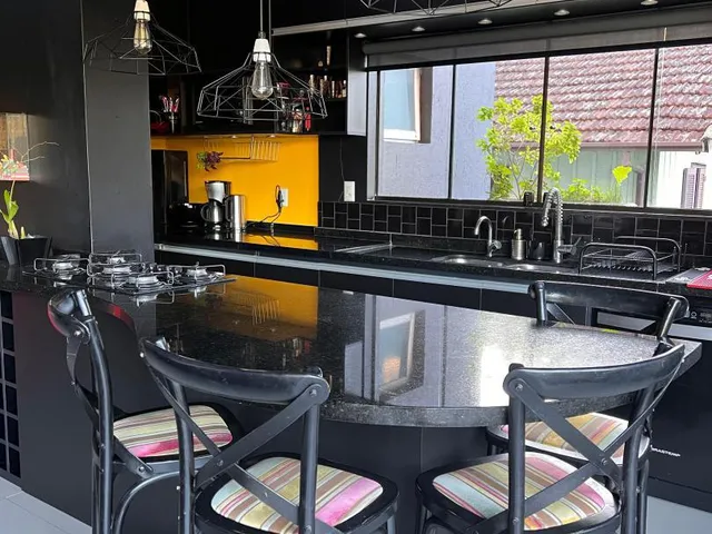 Imagem: Casa com três dormitórios, sendo uma suíte
