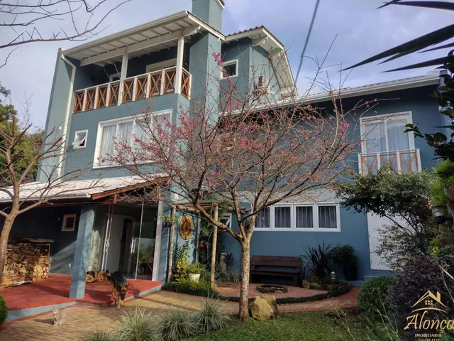 Imagem: Casa com três dormitórios sendo uma suíte