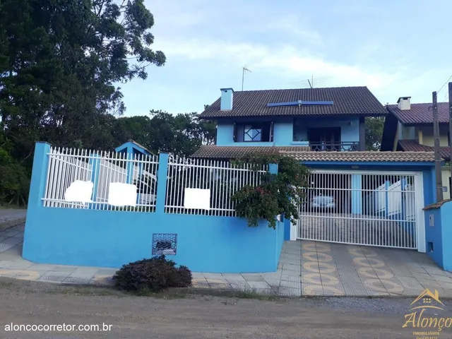 Imagem: Casa com três dormitórios sendo um uma