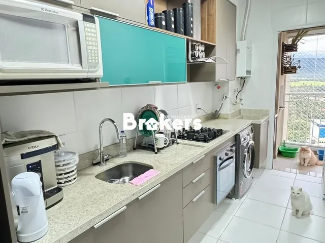 Imagem: O apartamento possui 2 Dormitórios, 1 Suíte, 2 Banheiros,