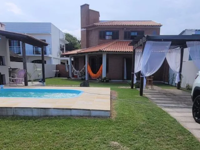 Imagem 2: Casa com piscina e quiosque em Atlântida Sul - Pronta para morar !!!