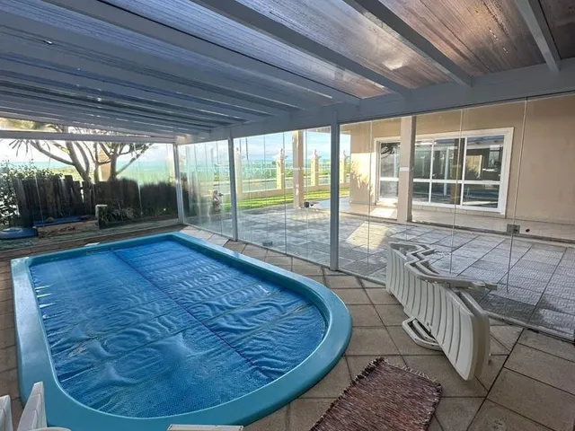 Imagem 14: Casa Beira Mar em Tramandaí - Alto padrão, 5 suítes e piscina aquecida!!!