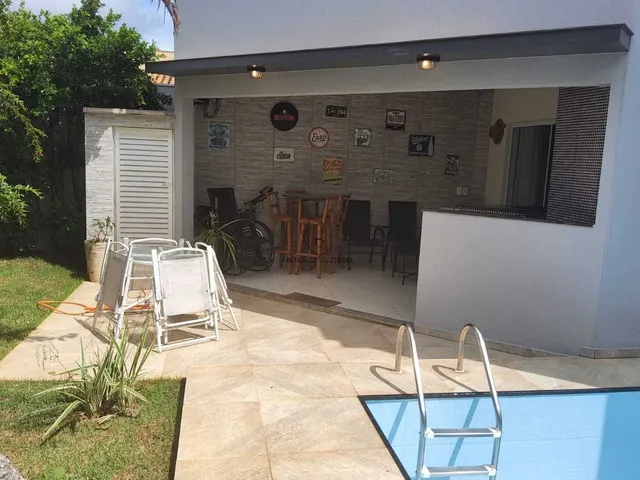 Imagem: A casa em condomínio possui 3 Dormitórios, 3 Suítes, 4
