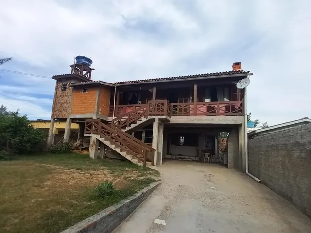 Imagem 2: Sobrado misto com 2 residências, 3 dormitórios, 4 banheiros