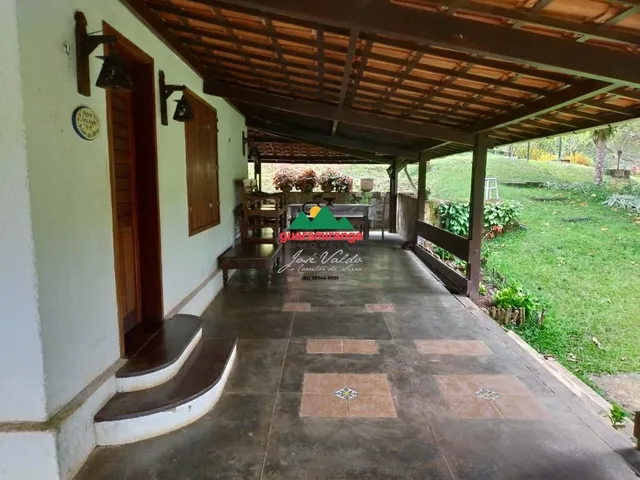 Imagem 5: Sítio de 4 ha, casa principal com 05 suítes, baias de cavalos e lago perene em G