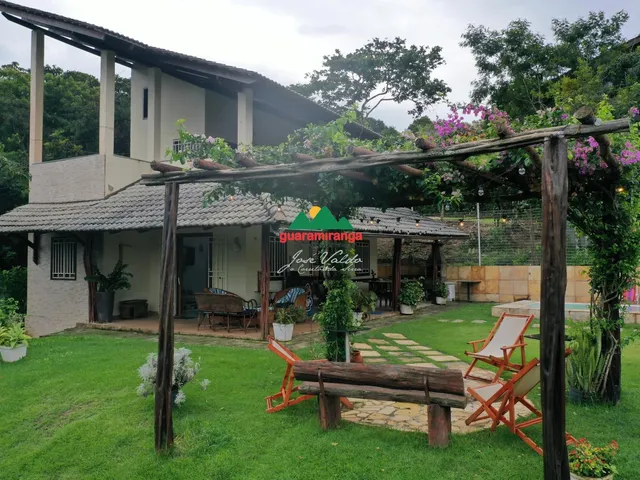 Imagem 2: Casa em condomínio informal com 3 quartos sendo 2 suítes, piscina aquecida e lar