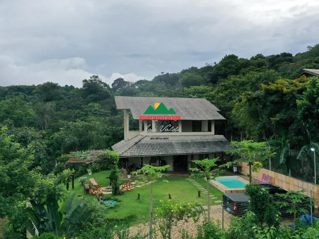 Imagem 8: Casa em condomínio informal com 3 quartos sendo 2 suítes, piscina aquecida e lar