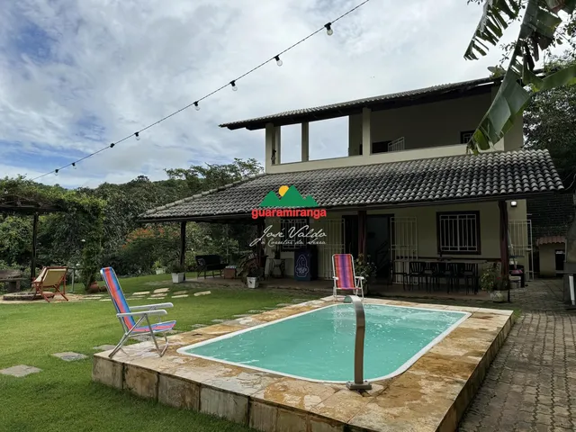 Imagem 14: Casa em condomínio informal com 3 quartos sendo 2 suítes, piscina aquecida e lar