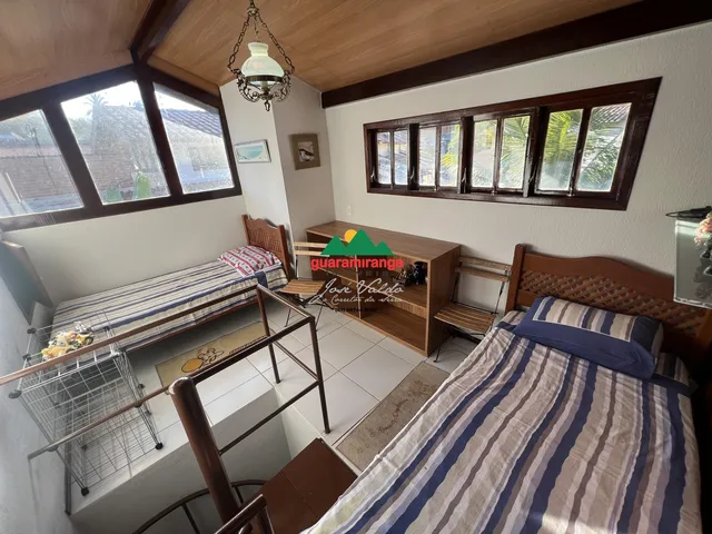 Imagem 16: Casa mobiliada em condomínio, com varanda, deck com churrasqueira e lavabo em Gu