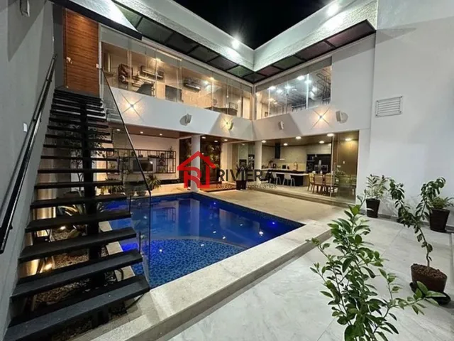 Imagem: A casa em condomínio possui 4 Dormitórios, 4 Suítes, 6