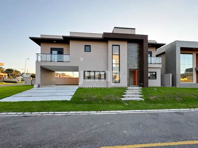 Imagem: A casa possui 4 Dormitórios, 3 Suítes, 4 Banheiros, 4