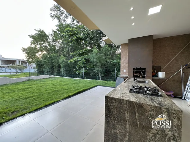Imagem 13: Casa Linear com 4 Suítes e Amplo Quintal no Condomínio Riviera Park