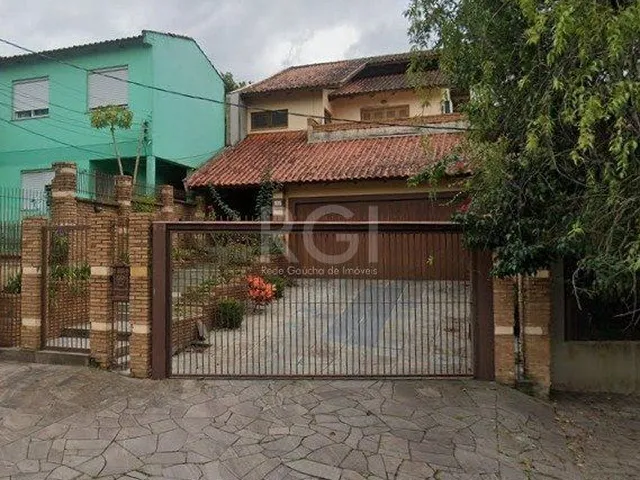 Imagem 10: Casa de 270m² - 3 dormitórios, 1 suíte, churrasqueira, pátio e 3 vagas de garage