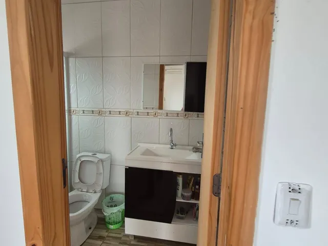 Imagem 1: Belíssima casa de 2 dormitórios com um amplo pátio na cidade de Passo Fundo