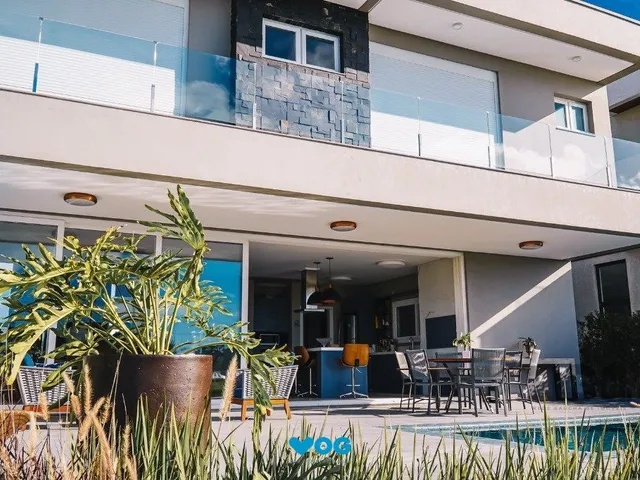 Imagem 2: Casa em Condomínio 5 dormitórios à venda Centro Xangri-Lá/RS