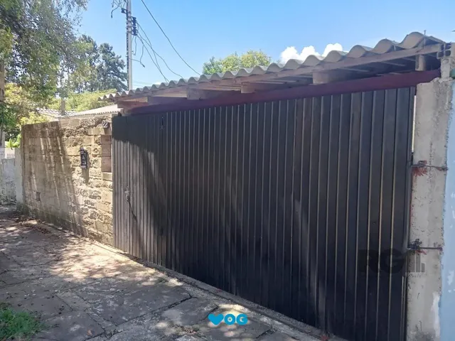 Imagem: Casa com 2 dormitórios, vaga, amplo pátio