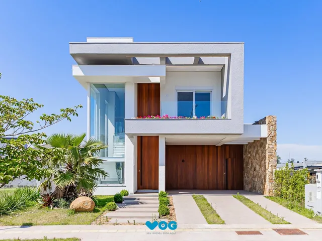 Imagem: A casa em condomínio possui 3 Dormitórios, 3 Suítes, 4