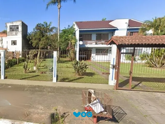 Imagem 1: Casa com 3 dormitótrios, piscina e 2 vagas de garagem em Canoas
