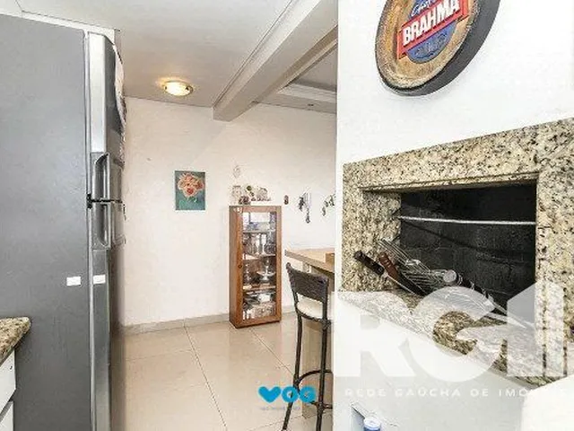 Imagem 2: Apartamento 3 Dormitórios com Suíte, Lareira e 2 Vagas