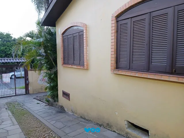 Imagem 2: Casa de 3 dormitórios, piscina e 4 vagas de garagem em Canoas