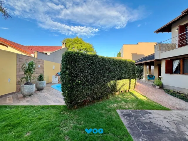 Imagem 1: Casa 4 dormitórios à venda Moinhos de Vento Canoas/RS