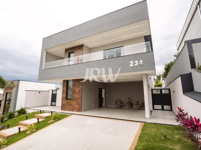 Imagem: A casa em condomínio possui 3 Dormitórios, 3 Suítes, 5