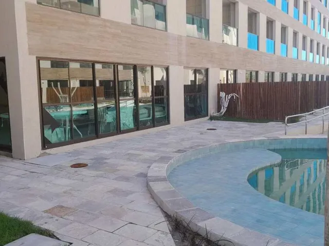 Imagem 6: Max Carneiros Suítes: Seu Refúgio Exclusivo com Piscina Privativa