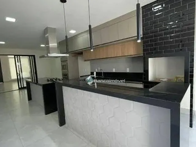 Imagem: A casa em condomínio possui 3 Dormitórios, 3 Suítes, 1